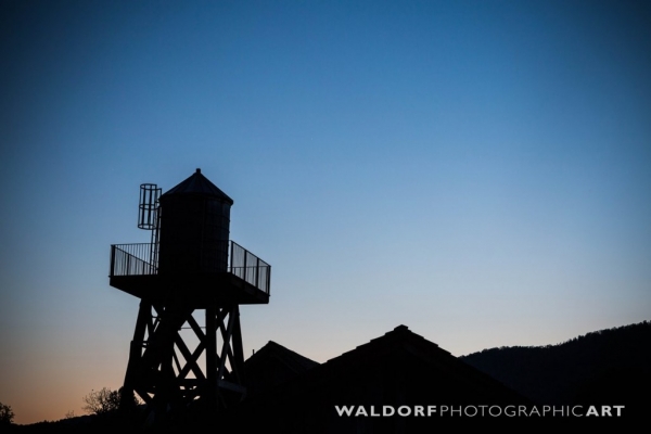 Silhouette of the water tower at dusk at Pure Water Farm near Maryville.